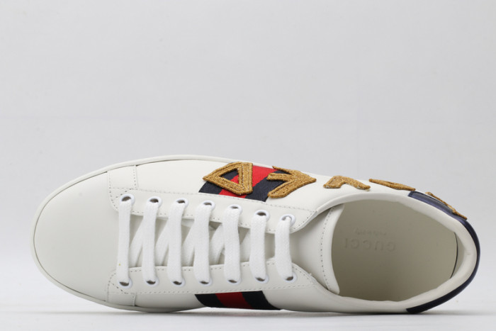 gu ace embroidered low-top sneaker