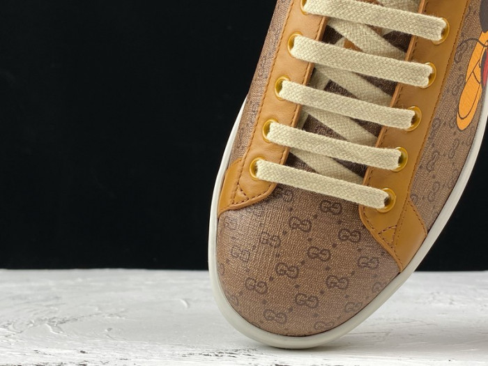 gu ace embroidered low-top sneaker