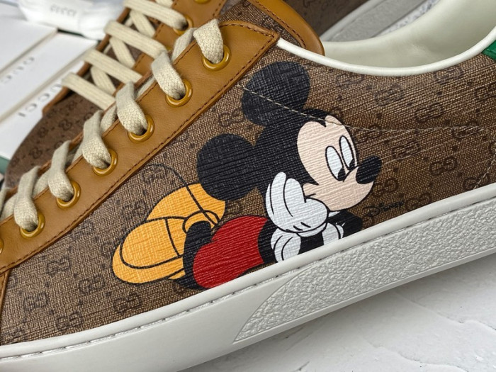 gu ace embroidered low-top sneaker