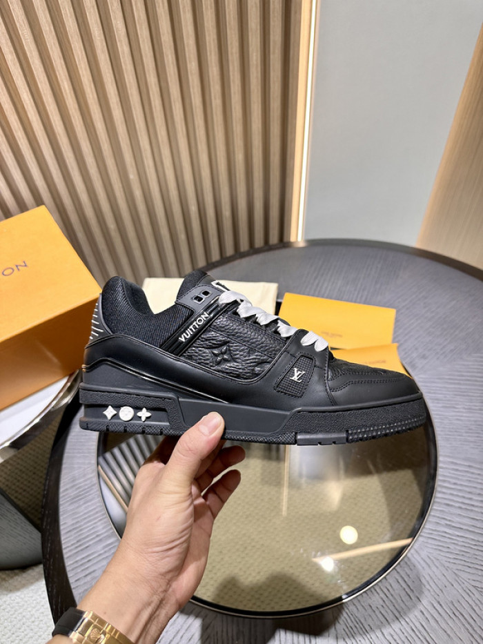 l**is V*t*n trainer black embossed monogram