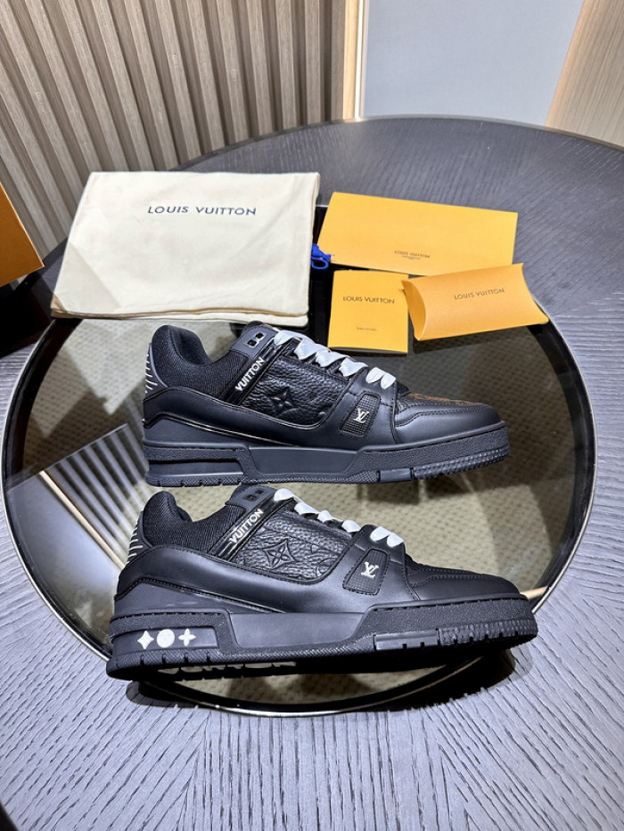 l**is V*t*n trainer black embossed monogram
