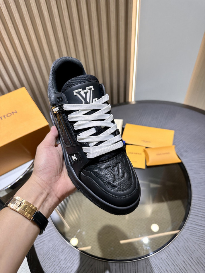 l**is V*t*n trainer black embossed monogram